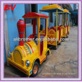 attractions kiddie rider, children play mini fun train on playground